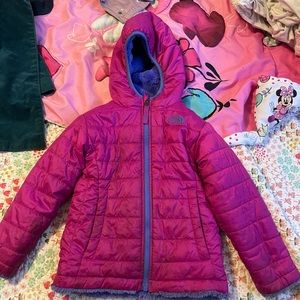 Super warm and soft reversible puffer coat from The North Face.